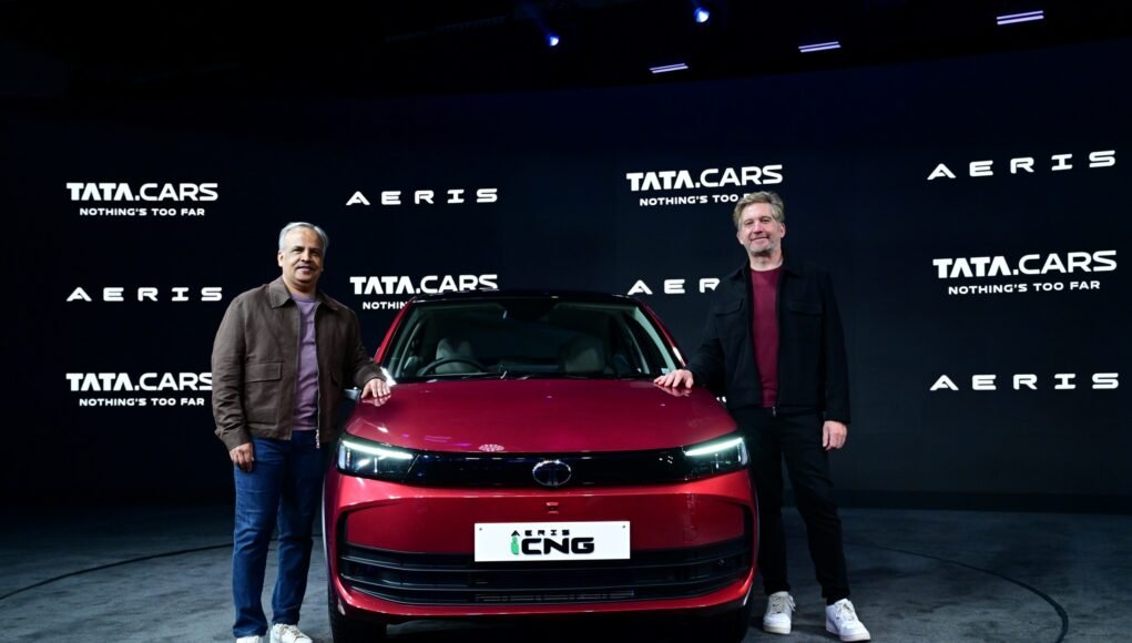 Image 4 - Mr. Anand Kulkarni, Chief Product Officer & HV Engineering, Tata Mo (1).Martin Uhlarik, Chief Design Officer, Tata Motors & Executive Director, TMDTC with the All New Aeris in Nitro Crimson (Launch
